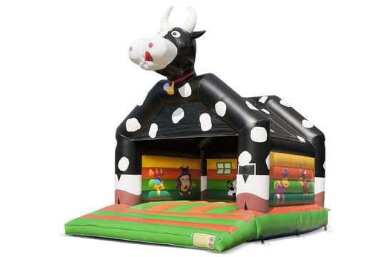 Grand château gonflable gonflable avec toit sur le thème de la vache à vendre pour les enfants. Disponible chez JB Gonflables France en ligne