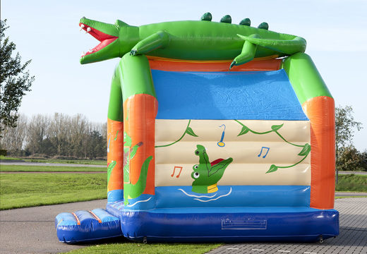 Commandez des château gonflable standard uniques avec un objet 3D d'un crocodile au sommet pour les enfants. Achetez des châteaux gonflables en ligne chez JB Gonflables France