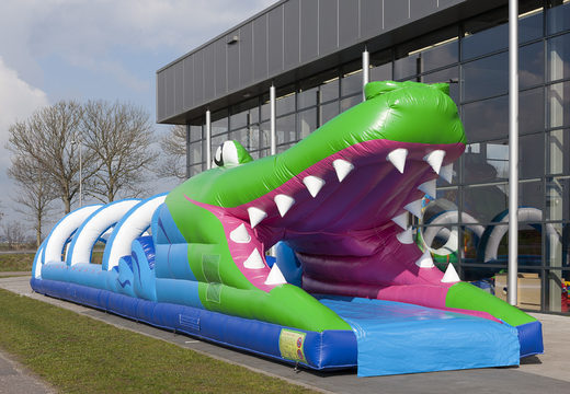 Commandez un toboggan gonflable parfait de 18 mètres de long sur le thème du crocodile pour les enfants. Achetez des toboggans gonflables maintenant en ligne chez JB Gonflables France