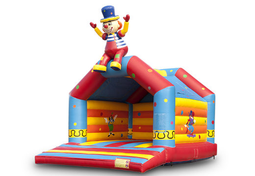 Achetez un grand château gonflable d'intérieur à thème clown assis pour enfant. Disponible chez JB Gonflables France en ligne