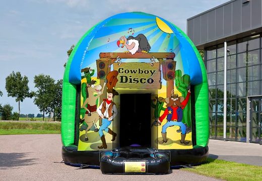 Commandez une château gonflable disco multi-thème de 3,5 m dans le thème Cowboy pour les enfants. Achetez des château gonflable avec musique chez JB Gonflables France