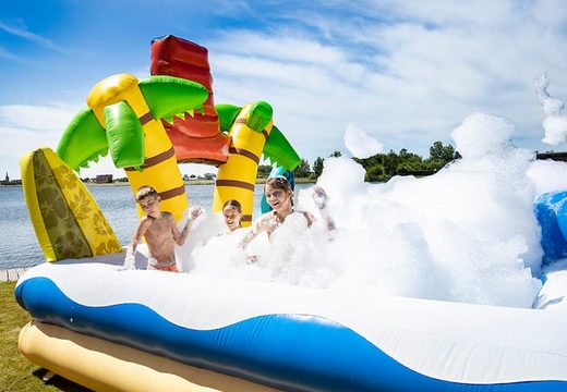 Acheter un grand parc à bulles château gonflable sur le thème d'Hawaï pour les enfants. Commandez des châteaux gonflables chez JB Gonflables France