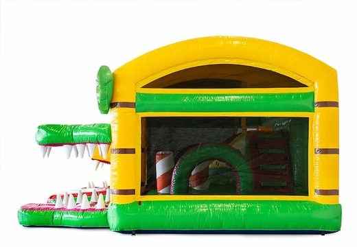 Château gonflable géant multijoueur Jungleworld avec un toboggan au milieu et des objets 3D pour les enfants. Commandez des super châteaux gonflables en ligne chez JB Gonflables France