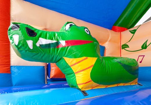 Commandez un château gonflable multifun avec une figure de crocodile 3D saisissante au sommet et un toboggan pour les enfants. Achetez des châteaux gonflables en ligne chez JB Gonflables France