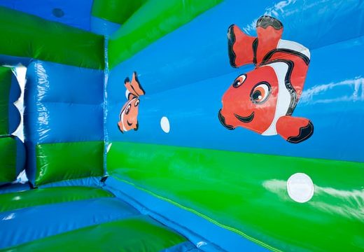 Achetez le château gonflable Turtle avec divers obstacles, un toboggan et un objet 3D sur le toit chez JB Gonflables France. Commandez des châteaux gonflables en ligne chez JB Gonflables France