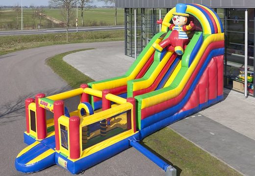 Toboggan gonflable multifonctionnel sur le thème du clown avec une pataugeoire, un objet 3D impressionnant, des couleurs fraîches et des obstacles 3D pour les enfants. Achetez des toboggans gonflables maintenant en ligne chez JB Gonflables France