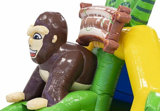 Commandez le videur gonflable combo toboggan avec un toboggan sur le thème de la jungle avec un gorille dessus