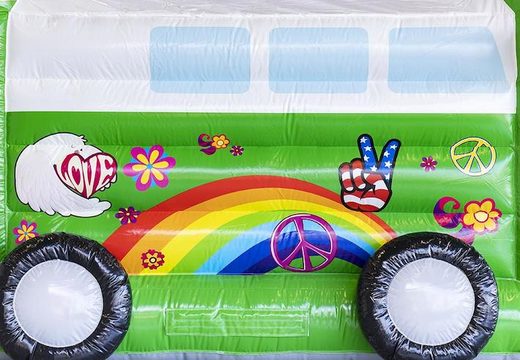Commandez château gonflable standard avec toit sur le thème hippie vert pour les enfants