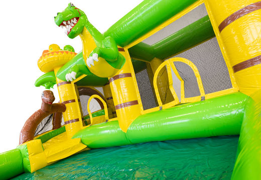 Achetez un grand château gonflable gonflable sur le thème Dino pour les enfants. Commandez des structures gonflables en ligne chez JB Gonflables France