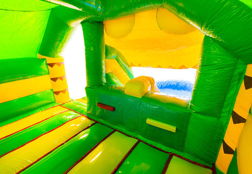À l'intérieur du château gonflable Double Slide Combo, jaune et vert