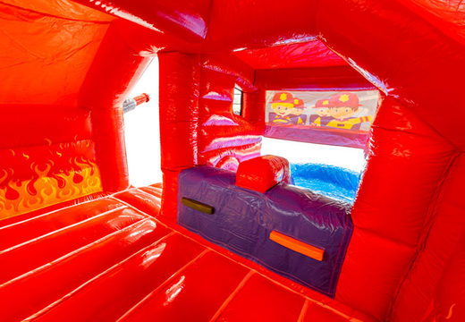 À l'intérieur du château gonflable Dubbelslide Slide Combo, bleu, rouge, orange
